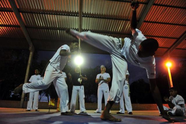  Alunos da Escola Municipal Rejane Garcia Gervini, na Vila Severo, Bairro Minuano, participam do Projeto Capoeira na Escola, em Santa Maria.SANTA MARIA, RS, BRASIL, 12/05/2014 (Fotos: Ronald Mendes/Agência RBS)