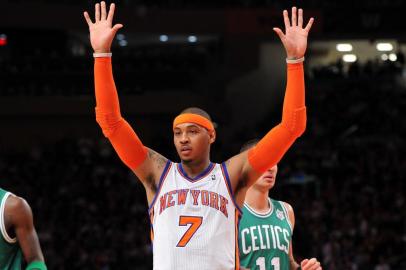 Carmelo Anthony foi decisivo na vitoria do New York Knicks sobre o Boston Celtics por 106 a 104 na partida que abriu a temporada 2011 2012 da NBA neste domingo NOTE TO USER User expressly acknowledges and agrees that by downloading and or using this photograph User is consenting to the terms and conditions of the Getty Images License Agreement Christopher Pasatieri Getty Images AFP Basquete - Carmelo Anthony -  New York Knicks - NBA