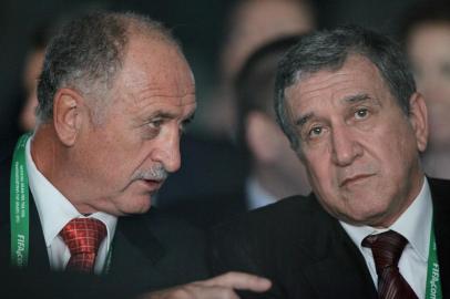 Brazil head coach Luiz Felipe Scolari, left, talks to his predecessor Carlos Alberto Parreira prior to the draw for the 2013 soccer Confederations Cup in Sao Paulo, Brazil, Saturday, Dec. 1, 2012. The soccer Confederations Cup will be played June 15 through June 30 in six Brazilian cities. (AP Photo/Nelson Antoine)