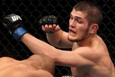 UFC on FX: Shalorus vs NurmagomedovNASHVILLE, TN - JANUARY 20:  (R-L) Khabib Nurmagomedov punches Kamal Shalorus during the UFC on FX event at Bridgestone Arena on January 20, 2012 in Nashville, Tennessee.  (Photo by Josh Hedges/Zuffa LLC/Zuffa LLC via Getty Images) Thiago Tavares Na GuardaEditoria: SLocal: NashvilleIndexador: Josh Hedges/Zuffa LLCSecao: UFCFonte: Zuffa LLCFotógrafo: Contributor