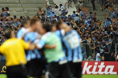  

PORTO ALEGRE, RS, BRASIL, 30/01/2013 (FOTO: DIEGO VARA / ZERO HORA) Busca por vaga na Libertadores, jogo na ARENA, Grêmio e e LDU. As pessoas caindo no fosso na Geral.
Indexador: Diego Vara                      