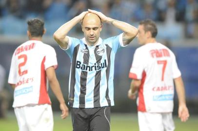  

PORTO ALEGRE,RS, BRASIL - 22/04/2013
FOTO:ADRIANA FRANCIOSI /ZERO HORA/agência RBS,ESPORTE
Campeonato Gaúcho 2013, Grêmio x São Luiz na arena do Grêmio.
Jogador Cris