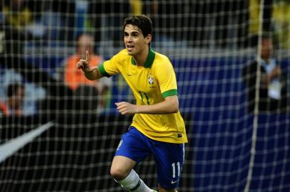  

PORTO ALEGRE,RS, BRASIL - 09/06/2013
FOTO:MAURO VIEIRA/ ZERO HORA 
Amistoso entre Brasil x França na Arena do Grêmio.
Jogador Oscar (11) abre o placar, Brasil 1 x 0 França