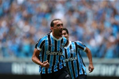  

PORTO ALEGRE, RS, BRASIL, 30-03-2014:Campeonato Gaúcho - primeiro jogo da final (Gre-Nal 400), Grêmio x Inter na Arena.(Foto:Bruno Alencastro/Agência RBS)
Jogador Barcos abre o placar Grêmio 1 x 0 Inter