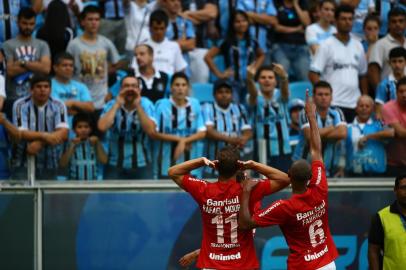  

PORTO ALEGRE, RS, BRASIL, 30-03-2014:Campeonato Gaúcho - primeiro jogo da final (Gre-Nal 400), Grêmio x Inter na Arena (Foto:Mauro Vieira/Agência RBS)
Jogador Rafael Moura faz seu gol