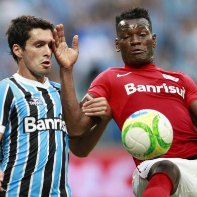  

PORTO ALEGRE, RS, BRASIL, 30-03-2014:Campeonato Gaúcho - primeiro jogo da final (Gre-Nal 400), Grêmio x Inter na Arena.(Foto:Diego Vara/Agência RBS)