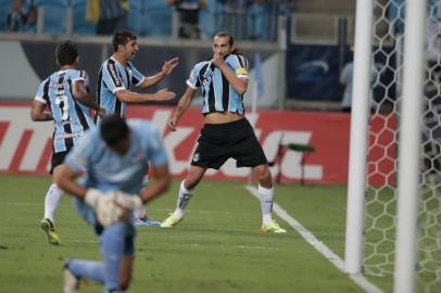  

PORTO ALEGRE , RS , BRASIL , 10-04-2014 - Libertadores da América, Grêmio x Nacional (URU) na Arena.(Foto : JEFFERSON BOTEGA/ Agencia RBS )
Jogador Barcos abre o placar fazendo gol de pênalti, Grêmio 1 x 0 Nacional-URU