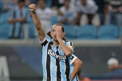  

PORTO ALEGRE , RS , BRASIL , 10-04-2014 - Libertadores da América, Grêmio x Nacional (URU) na Arena.(Foto : JEFFERSON BOTEGA/ Agencia RBS )
Jogador Barcos abre o placar fazendo gol de pênalti, Grêmio 1 x 0 Nacional-URU