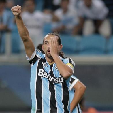  

PORTO ALEGRE , RS , BRASIL , 10-04-2014 - Libertadores da América, Grêmio x Nacional (URU) na Arena.(Foto : JEFFERSON BOTEGA/ Agencia RBS )
Jogador Barcos abre o placar fazendo gol de pênalti, Grêmio 1 x 0 Nacional-URU