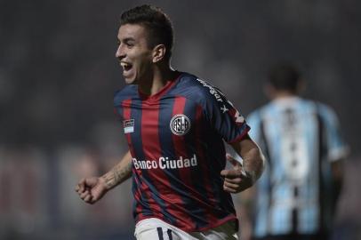  

Argentina's San Lorenzo midfielder Angel Correa celebrates after scoring against Brazil's Gremio during the Copa Libertadores 2014 round before the quarterfinals first leg football match at Pedro Bidegain stadium in Buenos Aires, Argentina, on April 23, 2014. AFP PHOTO / Juan Mabromata

Editoria: SPO
Local: Buenos Aires
Indexador: JUAN MABROMATA
Secao: Soccer
Fonte: AFP
Fotógrafo: STF