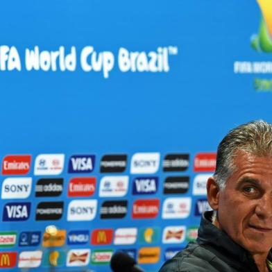 Iran's Portuguese coach Carlos Queiroz looks on during a press conference at The Mineirao Stadium in Belo Horizonte on June 20, 2014, on the eve of their Group F 2014 FIFA World Cup football match against Argentina. AFP PHOTO / BEHROUZ MEHRI