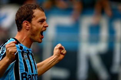  PORTO ALEGRE, RS, BRASIL - Brasileirão 2014, 15ª Rodada - Grêmio x Criciúma na Arena do Grêmio.(FOTO: RICARDO DUARTE/AGÊNCIA RBS)Jogador Lucas Coelho faz o segundo gol do Grêmio