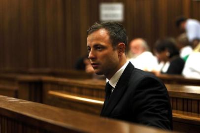 Paralympian Oscar Pistorius arrives at the High Court in Pretoria on  September 12, 2014 where judgment in his trial will continue. Pistorius has been acquitted of murdering his girlfriend Reeva Steenkamp.The accused therefore cannot be found guilty of murder dolus eventualis [legal intent]... that however is not the end of the matter as culpable homicide is a competent verdict, said Judge Thokozile Masipa on Thursday.The State has not proved beyond reasonable doubt that the accused is guilty of premeditated murder. AFP PHOTO/: Alon Skuy/Pool