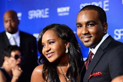 (FILES) Bobbi Kristina Brown (R) and Nick Gordon arrive at Tri-Star Pictures' "Sparkle" premiere at Grauman's Chinese Theatre in this August 16, 2012, file photo in Hollywood, California. Brown, the daughter of late singer Whitney Houston, was pulled unconscious from her bathtub at her home in Georgia in an eerie echo of her mother's tragic death three years ago, several US media reports said on January 31, 2015. The Atlanta Journal Constitution quoted local police as saying that Bobbi Kristina Brown, 21, was found by her husband and a friend at her home in Roswell, roughly 22 miles (35 kilometers) north of Atlanta. Emergency services were called to the scene before Brown was whisked to North Fulton Hospital for treatment, the report said. A spokeswoman for Roswell Police Department was not immediately available for comment.  Frazer Harrison/Getty Images/AFP/FILES