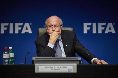 FIFA president Sepp Blatter holds a press conference at the FIFA headquarters in Zurich on March 20, 2015 at the end of a two-day meeting to decide the dates of the 2022 World Cup football tournament in Qatar. AFP PHOTO / MICHAEL BUHOLZER