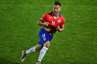 Chiles forward Eduardo Vargas celebrates after scoring against Peru during their 2015 Copa America football championship semi-final match, in Santiago, on June 29, 2015. AFP PHOTO / MARTIN BERNETTI