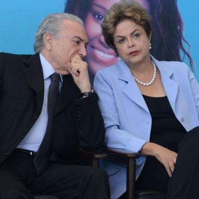 Vice-presidente Michel Temer e a presidente Dilma Rousseff no lançamento do programa de investimento em energia elétrica, no dia 11 de agosto