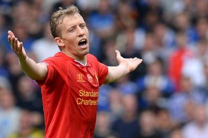 Liverpool's Brazilian midfielder Lucas Leiva reacts during the English Premier League football match between Liverpool and Chelsea at Anfield Stadium in Liverpool, northwest England, on April 27, 2014. Chelsea won the match 2-0. AFP PHOTO / ANDREW YATESRESTRICTED TO EDITORIAL USE. NO USE WITH UNAUTHORIZED AUDIO, VIDEO, DATA, FIXTURE LISTS, CLUB/LEAGUE LOGOS OR LIVE SERVICES. ONLINE IN-MATCH USE LIMITED TO 45 IMAGES, NO VIDEO EMULATION. NO USE IN BETTING, GAMES OR SINGLE CLUB/LEAGUE/PLAYER PUBLICATIONS