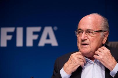 FIFA President Sepp Blatter gives a press conference at the end of a meeting of the FIFA Executive Comitee on September 26, 2014 at the organistation's headquarters in Zurich, after formalizing his candidacy for a 5th mandate at the head of the FIFA. AFP PHOTO / SEBASTIEN BOZON