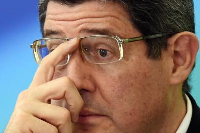  Brazilian Minister of Finance Joaquim Levy gestures as he delivers a press conference at the Planalto Palace in Brasilia on September 14, 2015. Brazil announced steep spending cuts and tax hikes Monday in response to a deepening economic crisis that has already caused a shock downgrade of its credit rating. AFP PHOTO/EVARISTO SAEditoria: POLLocal: BrasíliaIndexador: EVARISTO SASecao: politics (general)Fonte: AFPFotógrafo: STF