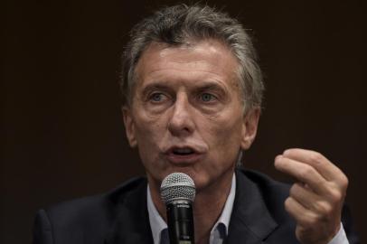 Argentina's president elect Mauricio Macri speaks during a press conference in Buenos Aires on November 23, 2015 the day after winning the run-off election against the ruling "Frente para la Victoria" party candidate Daniel Scioli. Macri, a former football executive expected to be Argentina's most economically liberal leader since the 1990s, promised a "marvelous" new era for his country, beleaguered by years of economic instability.       AFP PHOTO / JUAN MABROMATA / AFP / JUAN MABROMATA