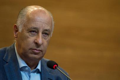 The president of the Brazilian Football Confederation (CBF) Marco Polo Del Nero speaks to the media after former CBF President Jose Maria Marin was arrested in a FIFA corruption scandal,  at th CBFs headquarters at Rio de Janeiro, Brazil, on May 29, 2015. Del Nero said Friday he knew nothing about bribes allegedly paid to his arrested deputy Jose Maria Marin, rejecting calls to resign.  AFP PHOTO / YASUYOSHI CHIBA