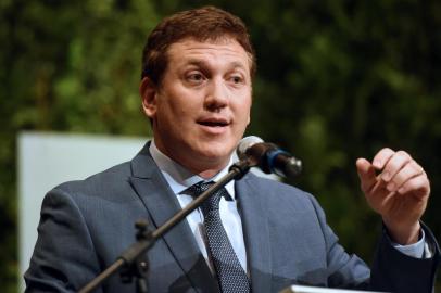 New Conmebol president, Paraguayan Alejandro Dominguez, speaks during a press conference after being elected until 2019 by consensus on January 26, 2016 in Luque, Paraguay. The five candidates to take over the FIFA presidency from the banned Sepp Blatter stepped up the frantic hunt for votes Tuesday as the campaign entered the final month. AFP PHOTO / NORBERTO DUARTE