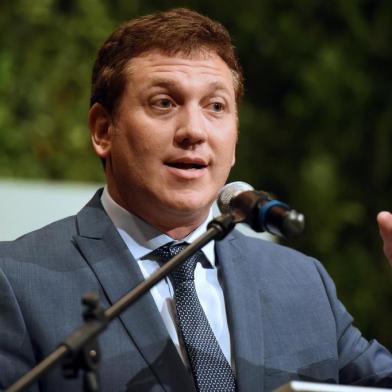 New Conmebol president, Paraguayan Alejandro Dominguez, speaks during a press conference after being elected until 2019 by consensus on January 26, 2016 in Luque, Paraguay. The five candidates to take over the FIFA presidency from the banned Sepp Blatter stepped up the frantic hunt for votes Tuesday as the campaign entered the final month. AFP PHOTO / NORBERTO DUARTE