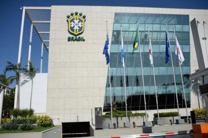  The facade of the headquarters of the Brazilian Football Confederation (CBF) at Barra da Tijuca neighbourhood in Rio de Janeiro, Brazil, on May 28, 2015. The CBF's headquarters is named after the CBF's former president and current member of the FIFA's organizing committee for the Olympic football tournaments, Jose Maria Marin, who was arrested today in Switzerland along with other FIFA officials, accused of corruption. Swiss police detained several FIFA leaders in a dawn raid Wednesday as part of a twin corruption inquiry that rocked world football's governing body two days before its leader Sepp Blatter seeks a new term. All now face deportation to the United States on charges of accepting more than $150 million in bribes. This morning the leaders of the CBF removed the name of Jose Maria Marin from its headquarters.      AFP PHOTO/VANDERLEI ALMEIDAEditoria: CLJLocal: Rio de JaneiroIndexador: VANDERLEI ALMEIDASecao: organized crimeFonte: AFPFotógrafo: STF