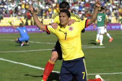  Colombias Carlos Bacca celebrates after scoring against Bolivia during their Russia 2018 FIFA World Cup South American Qualifiers football match, in La Paz on March 24, 2016.   AFP PHOTO / JORGE BERNAL / AFP / JORGE BERNALEditoria: SPOLocal: La PazIndexador: JORGE BERNALSecao: soccerFonte: AFPFotógrafo: STR