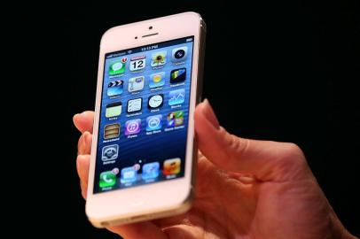 SAN FRANCISCO, CA - SEPTEMBER 12: The new iPhone 5 is displayed during an Apple special event at the Yerba Buena Center for the Arts on September 12, 2012 in San Francisco, California. Apple announced the iPhone 5, the latest version of the popular smart phone as well as new updated versions of the iPod Nano, Shuffle and Touch.   Justin Sullivan/Getty Images/AFP