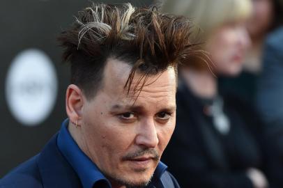 Actor Johnny Depp attends the premiere of Disney's "Alice Through The Looking Glass," May 23, 2106 at the El Capitan Theatre in Hollywood, California. 
Robyn BECK / AFP