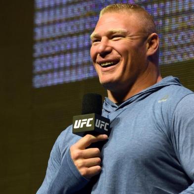 LAS VEGAS, NV - JULY 07: Mixed martial artist Brock Lesnar smiles as he takes questions from members of the media during an open workout for UFC 200 at T-Mobile Arena on July 7, 2016 in Las Vegas, Nevada. Lesnar will face Mark Hunt on July 9 in Las Vegas in a heavyweight bout that will serve as UFC 200s main event after Jon Jones was pulled from his light heavyweight title fight against Daniel Cormier due to a potential violation of the UFCs anti-doping policy.   Ethan Miller/Getty Images/AFP