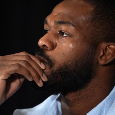 LAS VEGAS, NV - JULY 07: Mixed martial artist Jon Jones takes questions during a news conference at MGM Grand Hotel & Casino to address being pulled from his light heavyweight title fight at UFC 200 against Daniel Cormier due to a potential violation of the UFCs anti-doping policy on July 7, 2016 in Las Vegas, Nevada.   Ethan Miller/Getty Images/AFP