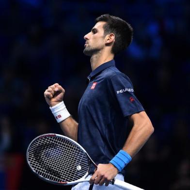  Serbia's Novak Djokovic celebrates after winning a point against Japan's Kei Nishikori during their men's semi-final singles match on day seven of the ATP World Tour Finals tennis tournament in London on November 19, 2016. Glyn KIRK / AFPEditoria: SPOLocal: LondonIndexador: GLYN KIRKSecao: tennisFonte: AFPFotógrafo: STR