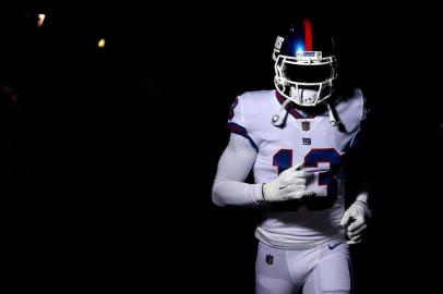 New York Giants v Philadelphia EaglesPHILADELPHIA, PA - DECEMBER 22: Wide receiver Odell Beckham Jr. #13 of the New York Giants runs to the field prior to the game against the Philadelphia Eagles at Lincoln Financial Field on December 22, 2016 in Philadelphia, Pennsylvania.   Al Bello/Getty Images/AFPEditoria: SPOLocal: PhiladelphiaIndexador: AL BELLOSecao: American FootballFonte: GETTY IMAGES NORTH AMERICAFotógrafo: STF