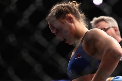 LAS VEGAS, NV - DECEMBER 30: Ronda Rousey reacts to her loss to Amanda Nunes in their UFC womens bantamweight championship bout during the UFC 207 event on December 30, 2016 in Las Vegas, Nevada.   Christian Petersen/Getty Images/AFP