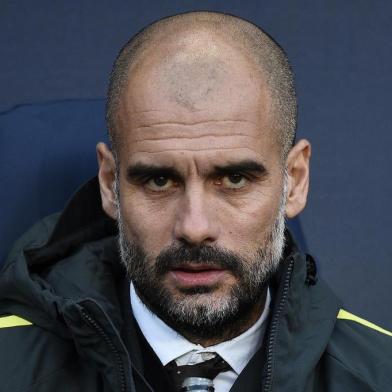 Manchester Citys Spanish manager Pep Guardiola reacts ahead of the English Premier League football match between Manchester City and Burnley at the Etihad Stadium in Manchester, north west England, on January 2, 2017. Oli SCARFF / AFP