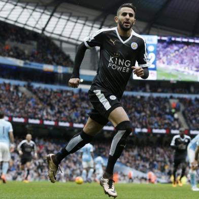 Leicester Citys Algerian midfielder Riyad Mahrez celebrates scoring his teams second goal during the English Premier League football match between Manchester City and Leicester City at the Etihad Stadium in Manchester, north west England, on February 6, 2016.