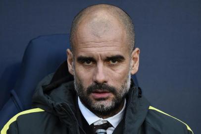 Manchester Citys Spanish manager Pep Guardiola reacts ahead of the English Premier League football match between Manchester City and Burnley at the Etihad Stadium in Manchester, north west England, on January 2, 2017. Oli SCARFF / AFP