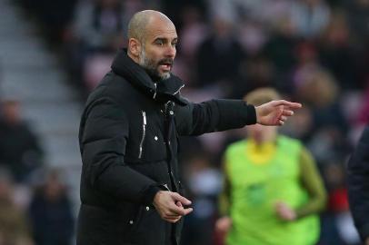 Manchester City's Spanish manager Pep Guardiola gestures on the touchline during the English Premier League football match between Sunderland and Manchester City at the Stadium of Light in Sunderland, north-east England on March 5, 2017. / AFP PHOTO / SCOTT HEPPELL / RESTRICTED TO EDITORIAL USE. No use with unauthorized audio, video, data, fixture lists, club/league logos or 'live' services. Online in-match use limited to 75 images, no video emulation. No use in betting, games or single club/league/player publications.  / 