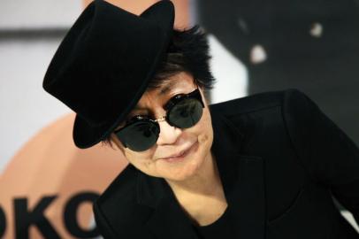 Japanese born artist Yoko Ono poses in front of her installation half a room during the press visit of her exhibition Half-a-wind show A retrospective at the Schirn Kunsthalle in Frankfurt am Main, central Germany, February 14, 2013. The exhibition runs from February 15 till May 12, 2013. AFP PHOTO / DANIEL ROLAND