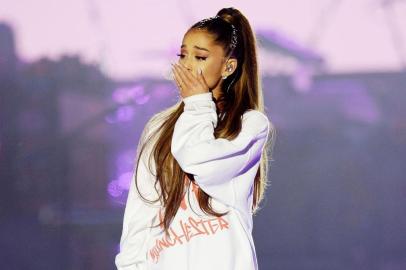 In this photograph released by One Love Manchester on June 4, 2017, US musician Ariana Grande performs at the One Love Manchester benefit concert for the families of the victims of the May 22, Manchester terror attack, at Emirates Old Trafford in Greater Manchester on June 4, 2017.  / AFP PHOTO / One Love Manchester / Dave Hogan for One Love Manchester / RESTRICTED TO EDITORIAL USE - MANDATORY CREDIT AFP PHOTO / ONE LOVE MANCHESTER / DAVE HOGAN - NO MARKETING NO ADVERTISING CAMPAIGNS - DISTRIBUTED AS A SERVICE TO CLIENTS