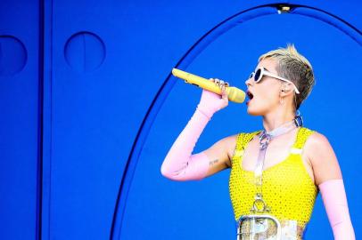 (FILES) This file photo taken on May 12, 2017 shows Katy Perry as she performs on stage during 102.7 KIIS FM's 2017 Wango Tango at StubHub Center in Carson, California.  Katy Perry's songs used to delight in first-time innocence -- she kissed a girl (and she liked it), and a night of love made her feel like she was living a teenage dream.Now 32, the pop superstar has discovered adulthood. On a new album, her sound is sultry and her experiences are anything but chaste."Witness," which comes out June 9, 2017, marks Perry's first album since 2013 and comes after the artist largely retreated for a year following the blockbuster success of her "Prism" album and tour. / AFP PHOTO / GETTY IMAGES NORTH AMERICA / Rich Fury