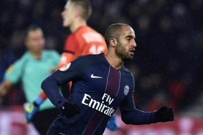 Paris Saint-Germains Brazilian midfielder Lucas Moura reacts after scoring during the French L1 football match between Paris Saint-Germain (PSG) and Lorient (FCL) at the Parc des Princes stadium in Paris, on December 21, 2016. MIGUEL MEDINA / AFP