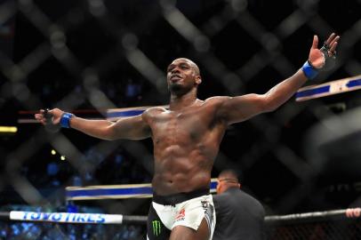 ANAHEIM, CA - JULY 29: Jon Jones reacts to defeating Daniel Cormier in the Light Heavyweight title bout during UFC 214 at Honda Center on July 29, 2017 in Anaheim, California.   Sean M. Haffey/Getty Images/AFP