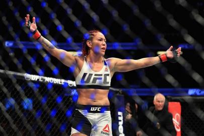 Cris Cyborg of Brazil reacts to defeating Tonya Evinger during their Featherweight Title fight at UFC 214 at Honda Center on July 29, 2017 in Anaheim, California. Sean M. Haffey/Getty Images/AFP 