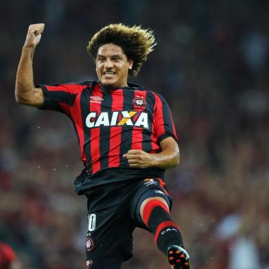 Felipe Gedoz of Brazils Atletico Paranaense celebrates a goal scored against Paraguays Deportivo Capiata during their Libertadores Cup football match at the Arena da Baixada stadium in Curitiba, Brazil on February 15, 2017. Heuler Andrey / AFP