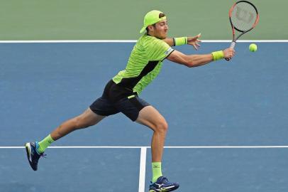 NEW YORK, NY - SEPTEMBER 03: Jamie Murray of Great Britain and Bruno Soares of Brazil in action during their mens doubles second round match against Marcelo Demoliner of Brazil and Marcus Daniell of New Zealand on Day Seven of the 2017 US Open at the USTA Billie Jean King National Tennis Center on September 3, 2017 in the Flushing neighborhood of the Queens borough of New York City.   Abbie Parr/Getty Images/AFP