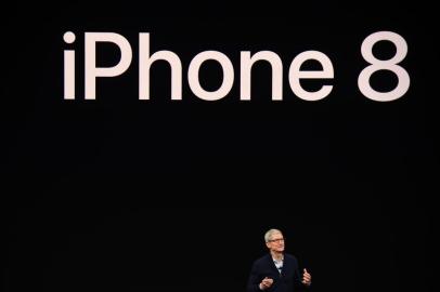 Apple CEO Tim Cook speaks about the new iPhone 8 during a media event at Apples new headquarters in Cupertino, California on September 12, 2017.  / AFP PHOTO / Josh Edelson